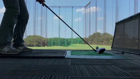 Man plays with the driver on a driving range in Yokohama. Stock Footage 137288379