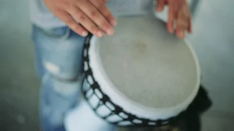 Man plays a drum Stock Footage 65259329