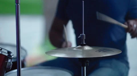 A man plays on a drum set Stock Footage 50349760