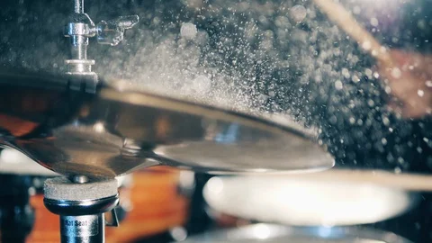 Man plays drums in a studio, hitting cymbals. Drummer, drumset, drums in slow Stock Footage 128174989