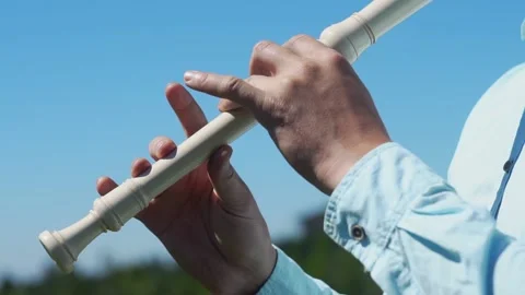 A man plays a flute 動画素材 139439612