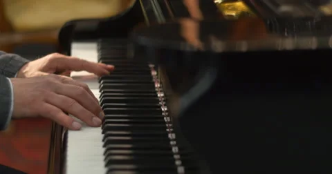 Man Plays Gently Piano Vídeo Stock 62331034