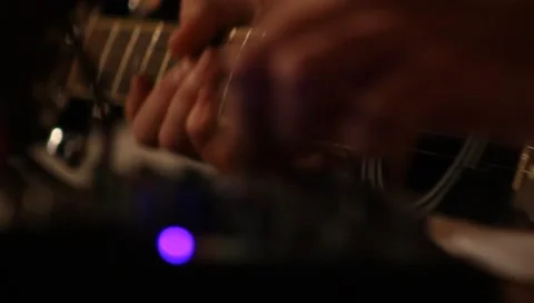 A man plays the guitar closeup Stock Footage 7748759