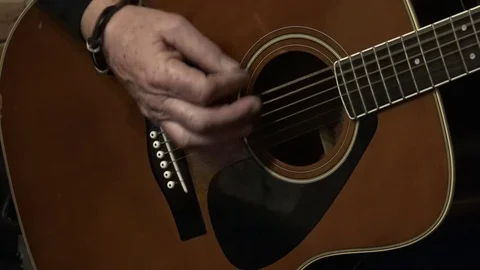 A man plays guitar - closeup Video stock 82680591