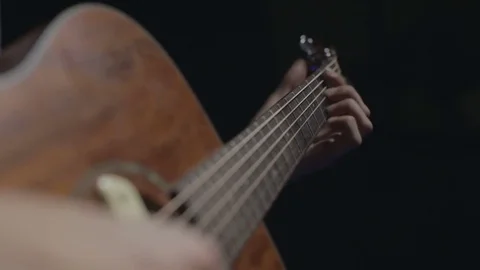 A man plays the guitar 스톡 동영상 74934700