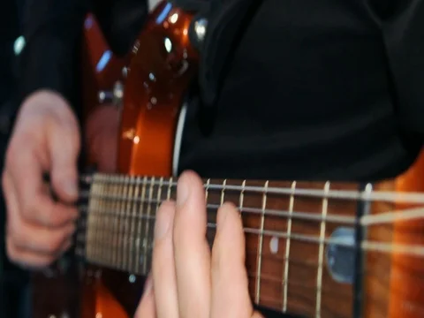 A man plays the guitar, hands Stock Footage 73572928