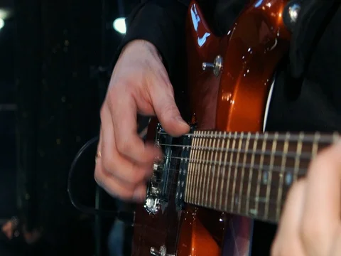 A man plays the guitar, hands Stock Footage 73573111