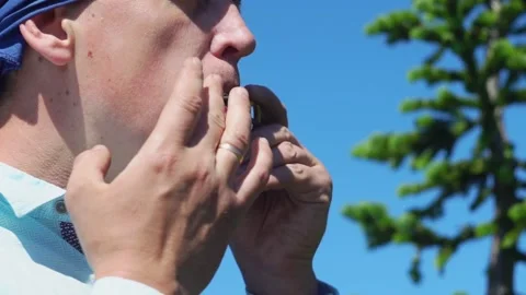 A man plays the harp Stock Footage 135852417