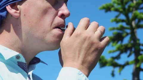 A man plays the harp Stock Footage 136312179
