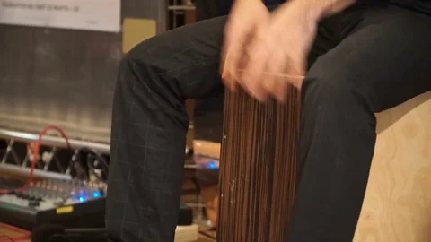 Man plays his hands on the box Stock Footage 78167559