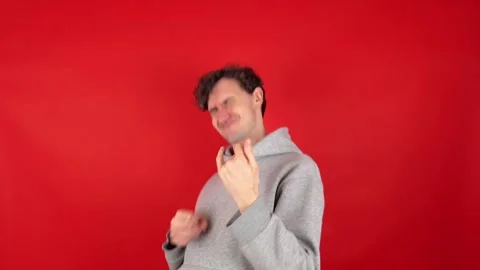 Man plays imaginary guitar. Stock Footage 304749809