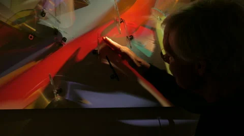 Man Plays with light painting Stockbeeldmateriaal 54051285