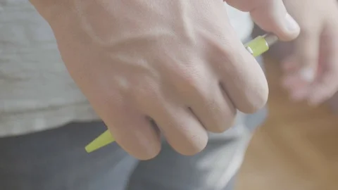 Man plays with pen Video stock 96169749