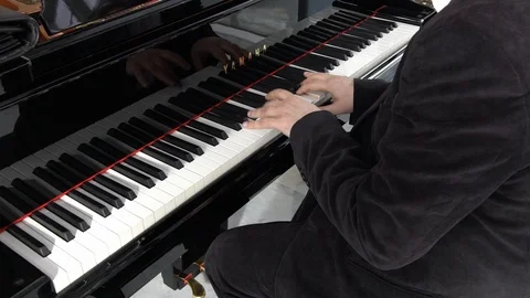 The man plays piano 스톡 동영상 116348795