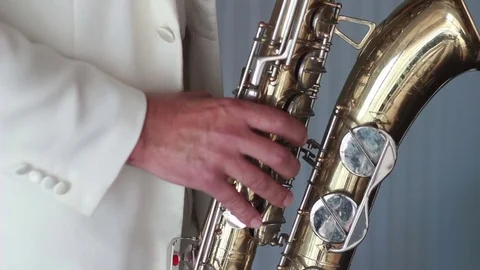 Man plays a saxophone Stock Footage 71208241