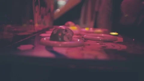 Man plays on the slot machine Stock Footage 76608833