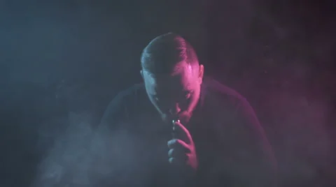 Man plays with smoke Stock Footage 64309267