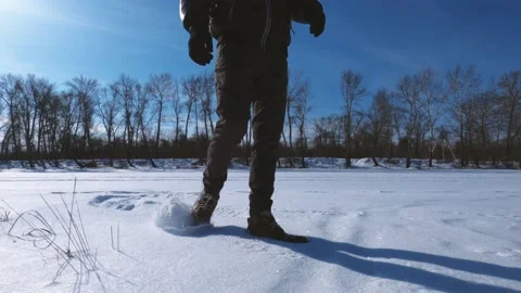 A man plays with snow Stock Footage 149501427