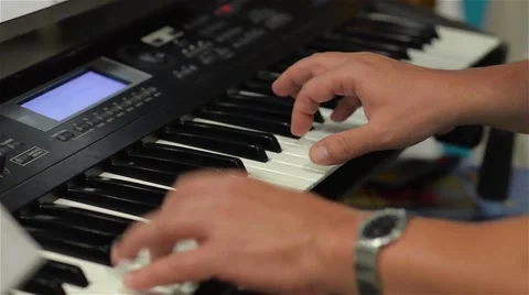 Man plays on synthesizer, hands close-up, party, disco Stock Footage 63456149