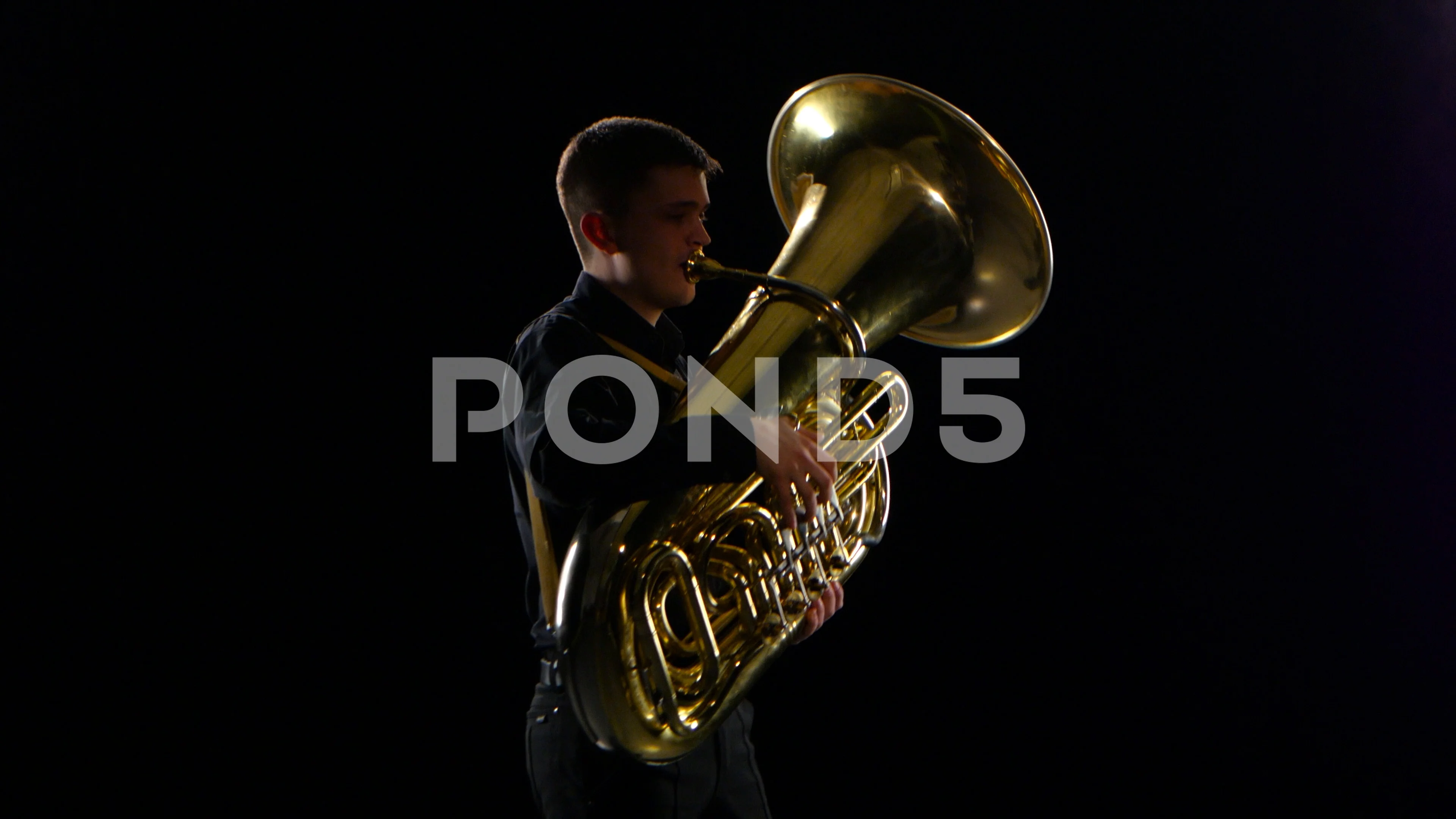 Man plays on the tuba slow melody. Black, Stock Video