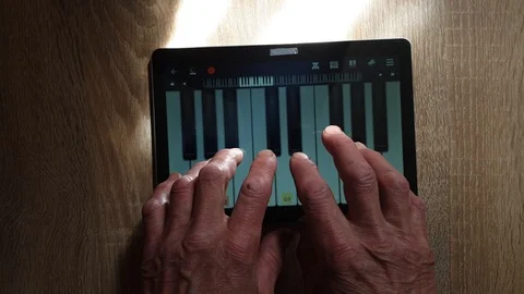 The man plays the virtual piano. Stock Footage 107287163