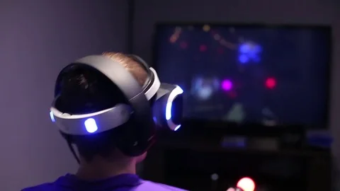Man plays VR video game Stock Footage 75391896