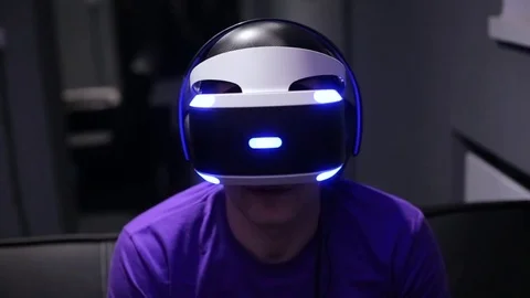 Man plays VR video game Stock Footage 75391987