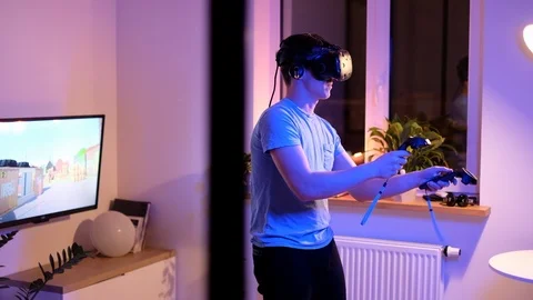 Man plays VR video game. Video stock 102214253