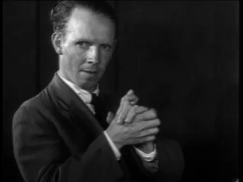 Man plays Yankee Doodle with Hands strange archival footage 1933 Stock Footage 79628170