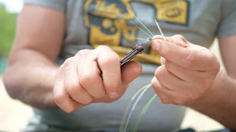 Man plugging in a fiber optic hub cable Stock Footage 156524457