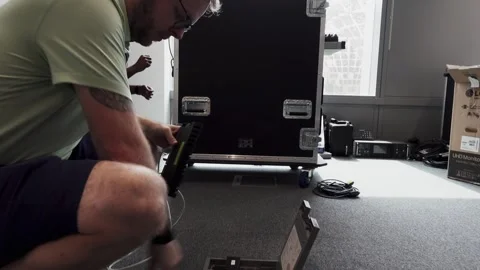 Man plugging in wifi router into the flo... | Stock Video | Pond5