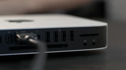 Man Plugs USB Thumb Drive into Computer Stock Footage 56350426
