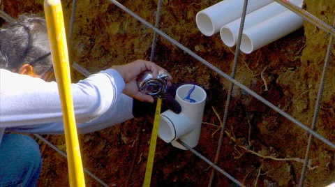 Man plumbing spa measures Stock Footage