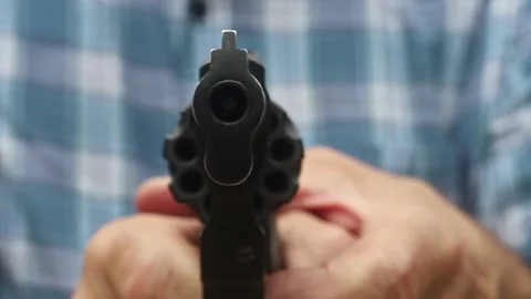 Man Point  A starting gun, close up Stock Footage 158932042