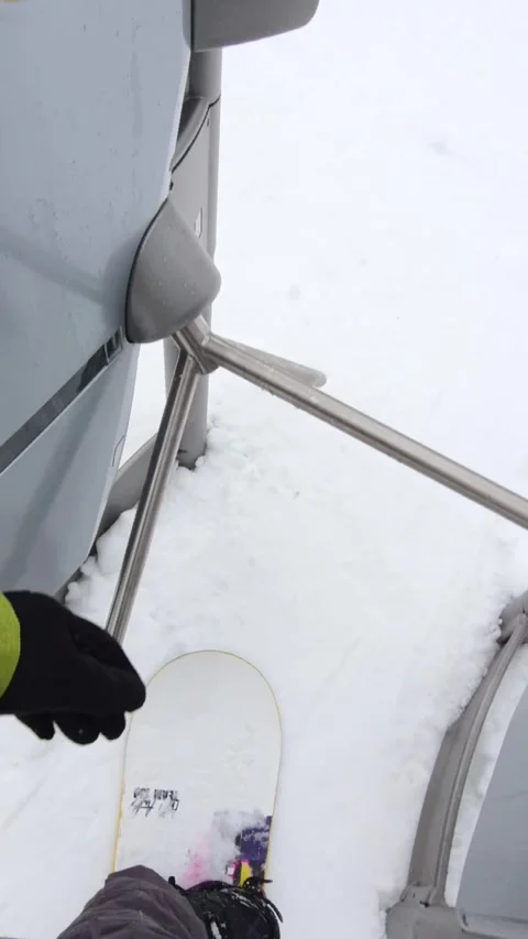 Man point of view passing ski pass gate lift chair Video stock 219306371
