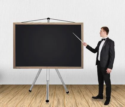 Man pointing on blackboard Stock Photos