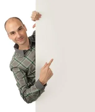Man pointing at a blank board Stock Photos