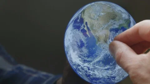 A man pointing at the earth on a screen Video stock 102955471