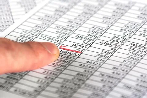 Man pointing on an error-correcting in a document 写真素材