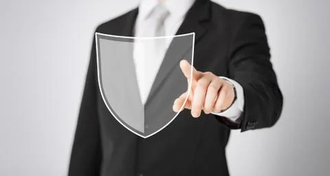 Man pointing finger at antivirus program icon Stock Photos