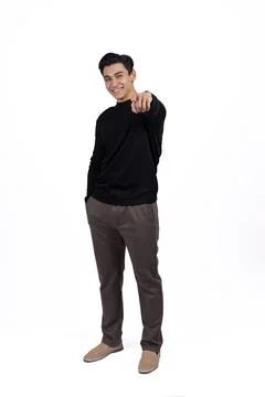 Man pointing finger down at empty space. Stock Photos
