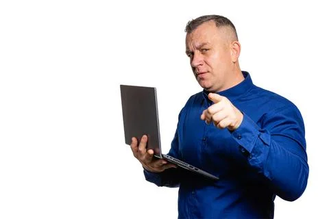 Man pointing forward while working on laptop Stock Photos