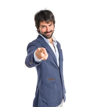 Man pointing to the front over white background Stock Photos