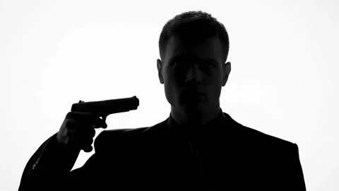 Man pointing gun to head, suicide thoughts, in despair because of debt, taxes Stock Footage 85871905