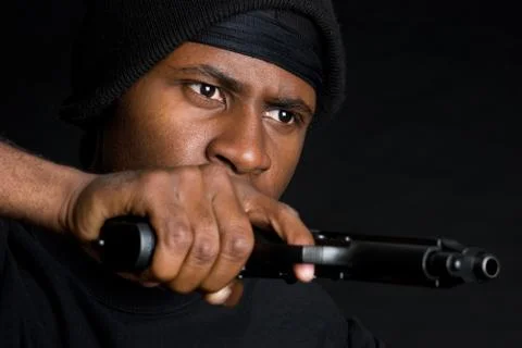 Man pointing gun Stock Photos