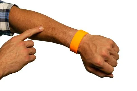 Man pointing to his arm Stock-Fotos