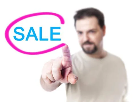 Man pointing An image of a nice man pointing to a sale sign ,model release... Stock Photos