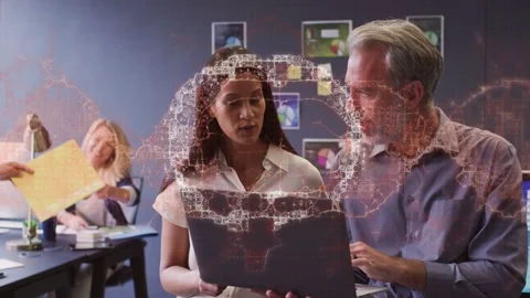 Man pointing laptop sparking holo net mapping tech data woman reviewing peer Stock Footage 332844358