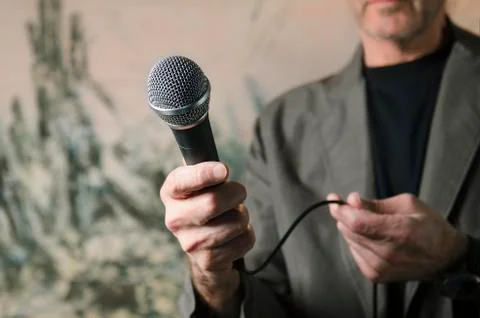Man pointing microphone Stock Photos