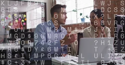 Man pointing at papers and laptop, woman questioning, code overlay showing Stock Footage 331276287